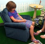 Shauna (Last Name Withheld) enjoying the 2013 summer reading series.