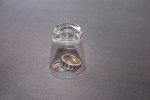 Shot glass and wedding rings
